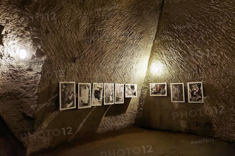 Photo gallery with scenes from everyday refugee life during World War II, Galleria Borbonica, Bourbon Tunnel, underground Naples, Province of Campania, Italy