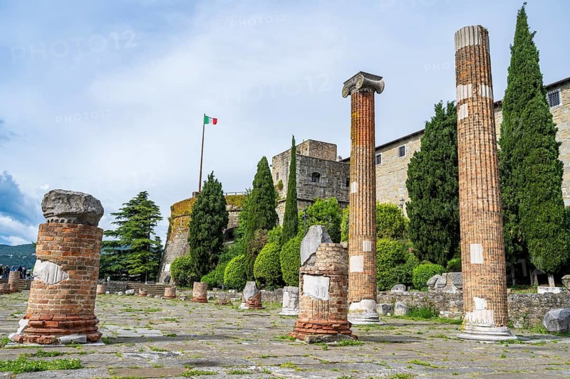 Ruins of the ancient Roman Forum on the San Giusto hill, in the back Castello di San Giusto, Trieste, Friuli-Venezia Giulia region, Italy