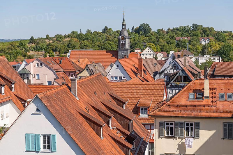 View from above over the roofs of the historic old town of Marbach am Neckar, church tower of the town church, roofs, roof landscape, historic old town, half-timbered houses, historic buildings, cityscape, old town alleys, Neckar region, Baden-Württemberg, view from above, bird's-eye view, city view, historic architecture, red tile roofs, rows of houses, city center, picturesque old town, medieval cityscape, historic city backdrop, urban roof landscape, Baden-Württemberg, Germany