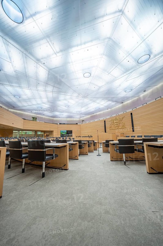 Modern meeting room with wooden details and large ceiling lights, Parliament of Baden-Württemberg, Stuttgart, Germany