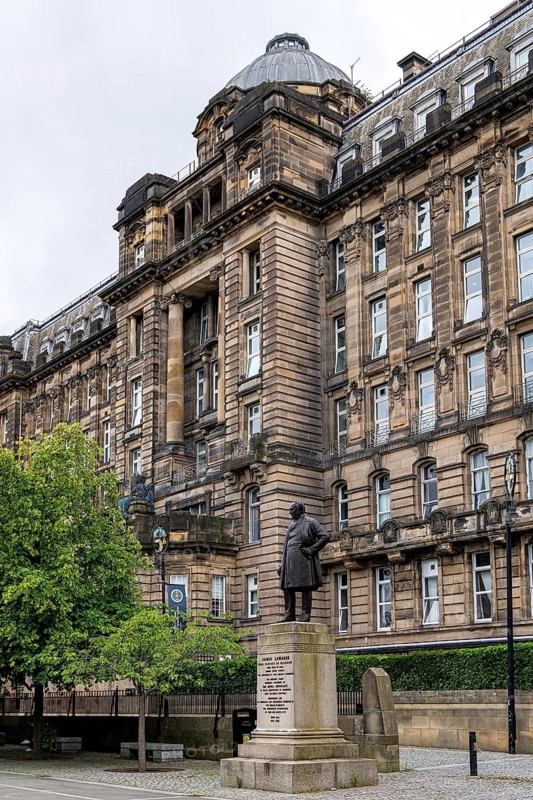 Bronze statue of James Lumsden stands before the grand Glasgow Royal Infirmary Jubilee Block facade, Glasgow, Scotland, United Kingdom