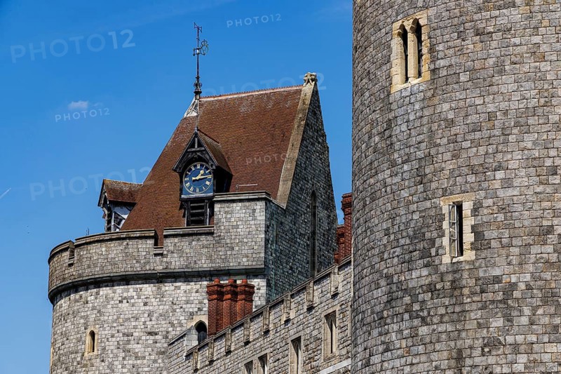 A gabled clock stage with a weathervane crowns the medieval Curfew Tower at Windsor Castle, a thirteenth century structure that has served as the clock tower and bell chamber for St George's Chapel since the late fifteenth century, Windsor, England, United Kingdom