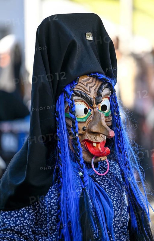 Member of a fools' guild in traditional Haes, fools' clothes, during the carnival procession in Achern, Ortenaukreis, Baden-Württemberg, Germany