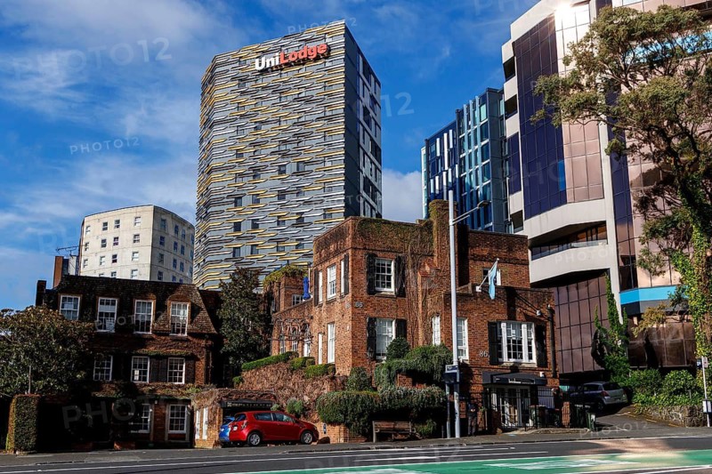 Historic Brickhouse Bar and Restaurant with UniLodge tower and modern buildings behind, Auckland city, Auckland, New Zealand