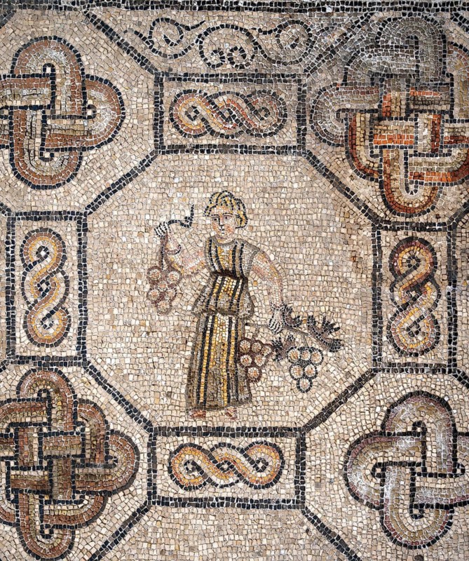 Detailed floor mosaic with geometric patterns and depictions of a person with vines, Basilica di Santa Maria Assunta, Basilica of Aquileia, UNESCO World Heritage Site, Aquileia, Friuli, Italy