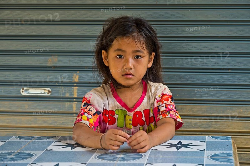 Laotian girl in a Hmong village, Pha Yung, Muang Ngoi on the Nam Ou River, Phongsali Province, Laos