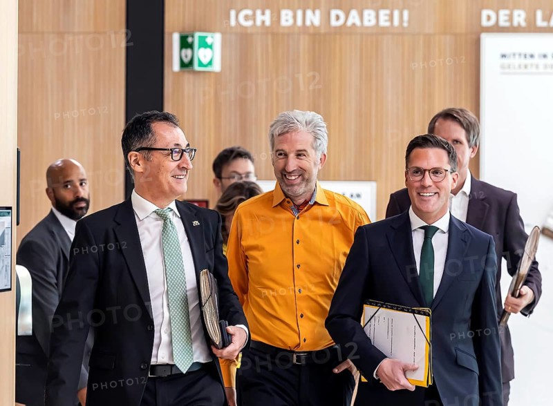 State press conference with Minister-President Cem Özdemir (left, Greens), Interior Minister Manuel Hagel (right, CDU) and Tübingen's Lord Mayor Boris Palmer (centre, independent) . Palmer has been appointed for a fixed term of two years to the Independent Council for State Modernisation and Administrative Simplification. 28 July 2026, Stuttgart, Baden-Württemberg, Germany