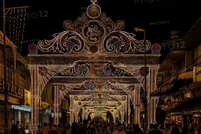 Large trains and luxurious street lighting in a pedestrian zone, night view, old city center, Chiang Mai, Thailand
