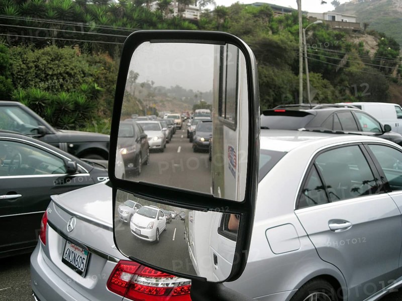 Looking in the rearview mirror, traffic, traffic, smog on the famous Pacific Coast Highway, California State Route 1 in Malibu, California, USA