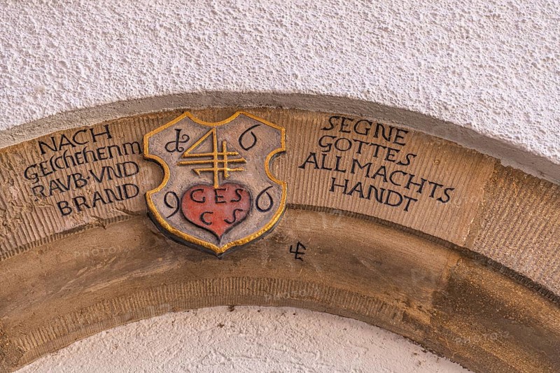 Schroll house brand on the arched portal with house blessing from 1696, Marktstraße pedestrian zone in the city center, old town of Marbach am Neckar, historic buildings, half-timbered houses, market street, after the great robbery and fire, bless the hand of God's omnipotence, religious house blessing, Christian symbolism, sandstone portal, traditional house signs, house entrance, house inscription, inscription, family sign, blessing Schutzsegen, Baden-Württemberg, Germany