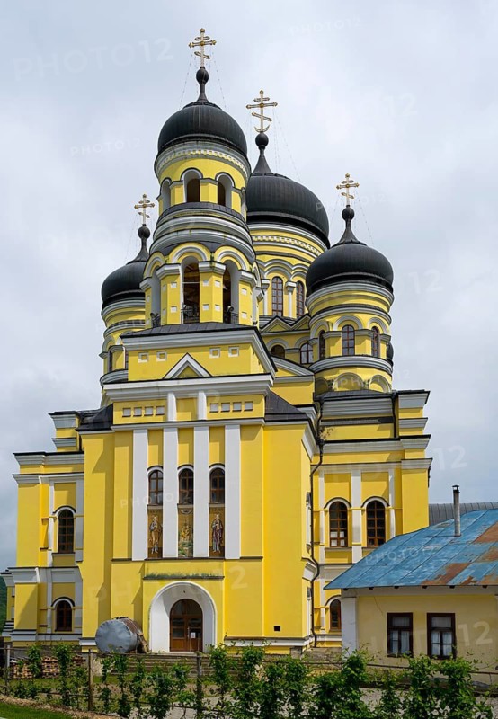 Large Orthodox church with impressive yellow façade and several domes, Hîncu monastery, Hâncu, Hâncul, Hincu, Hancu, Hancul, located near the village of Bursuc, Nisporeni district, Republic of Moldova, Moldova