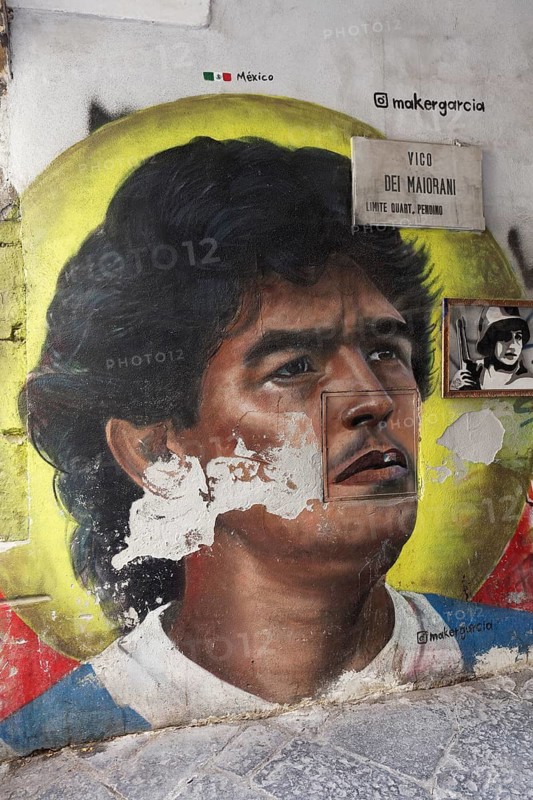 Diego Maradonna wall painting with halo, Neapolitan soccer icon, street art at Quartieri Spangoli, Spanish Quarter, Naples, Campania, Italy