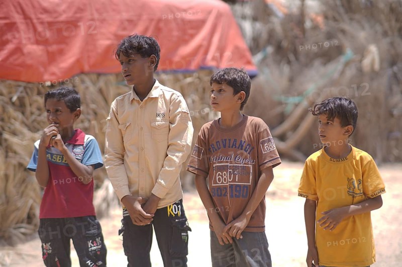 Yemeni children living in a refugee camp under difficult humanitarian conditions. Yemen, April 12, 2024, Seiyun, Yemen