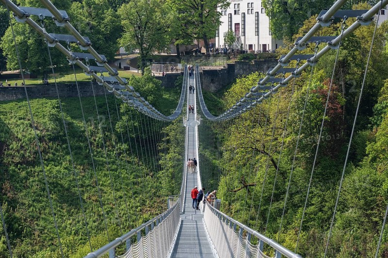 The Neckarline, a pedestrian suspension bridge up to 60 meters high with a wingspan of 606 meters above the Neckar Valley. The tourist attraction, built from a total of 444 tons of steel, serves to connect the historic old town and Bernese Field, where the 246 meter high TK Elevator test tower with the highest viewing platform in Germany is located. The Neckarline is the longest suspension bridge in southern Germany, Rottweil, Rottweil district, Baden-Württemberg, Germany