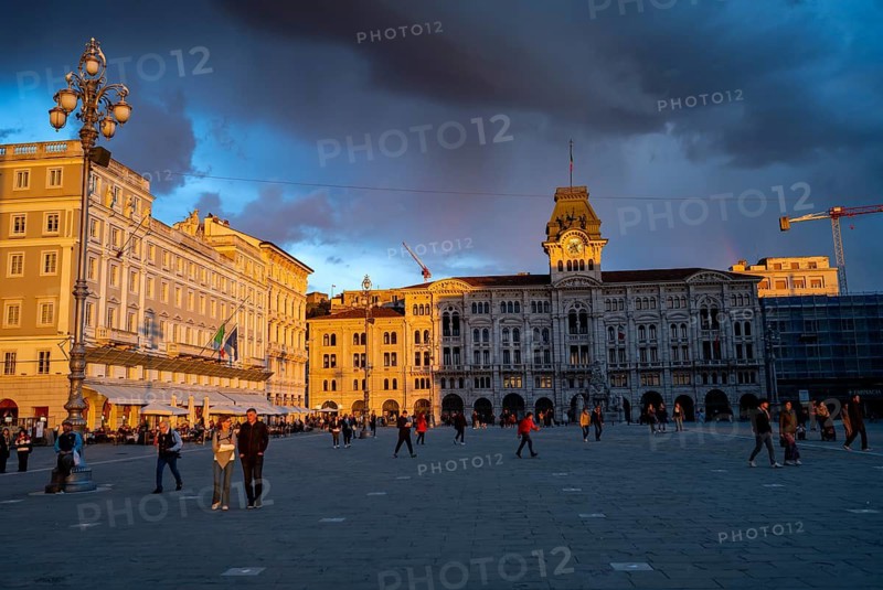 Town Hall and Palazzo Stratti in the evening light at sunset, Piazza Unità d'Italia square, dramatic clouds, old town, Trieste, Friuli-Venezia Giulia region, Italy