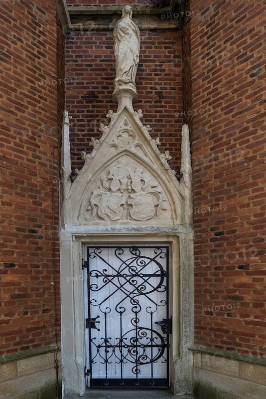 Entrance to the chapel with coat of arms, moated castle Haus Hülshoff, Havixbeck near Münster, North Rhine-Westphalia, Germany