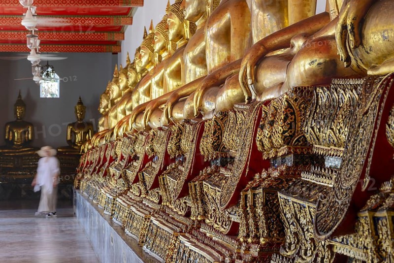Gilded Buddha statues (Bhumispara-mudra: Gautama Buddha at the moment of enlightenment), Wat Pho, Bangkok, Thailand