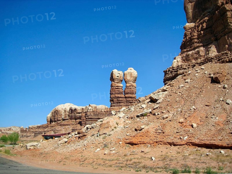 Two distinctive pillars, sandstone rock formations, erosion, twin rocks, Navajo Twin Rocks in Bluff, Utah, USA