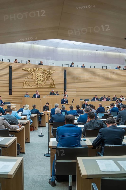 Government meeting with speaker in front of a group in a modern room, state parliament of Baden-Württemberg, Stuttgart, Germany