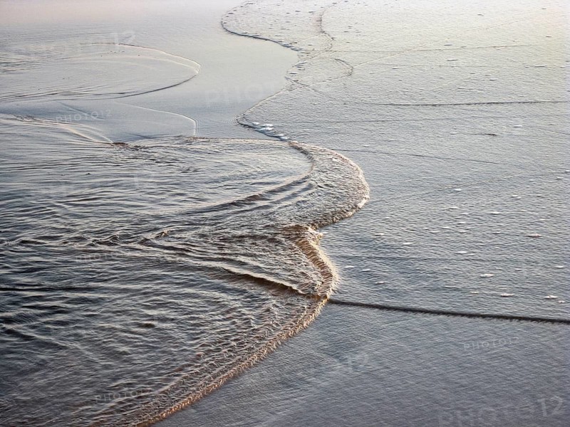 Wavy ripples and lines, opposite water flows, incoming wave, outgoing water, arc-shaped, sedimentary structure, North Sea, Wenningstedt, Sylt, Germany