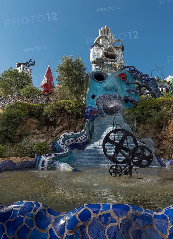 Water feature and colorful sculptures, Giardino dei Tarocchi or Garden of Tarot, by Niki de Saint Phalle and Jean Tinguely, near Capalbio, Grosseto Province, Tuscany, Italy