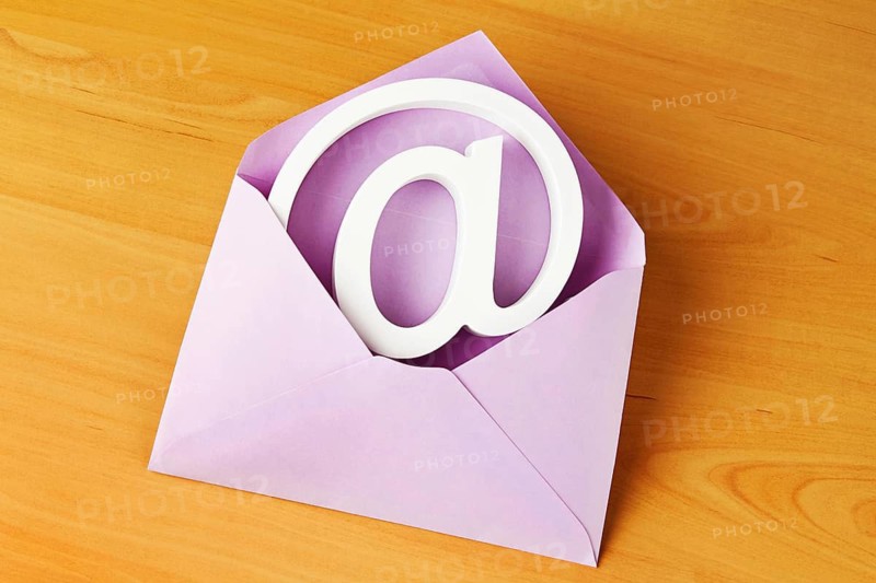 There is an e-mail sign in an envelope. Letter mail versus electronic mail, Austria