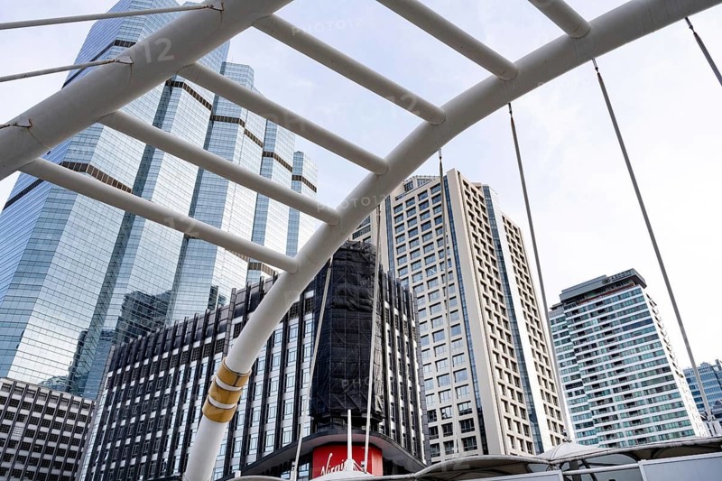 Modern architecture of the public sky walk bridge at Chong Nonsi sky train station, Sathorn Square, Bangkok, Thailand, Asia