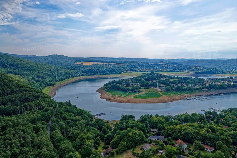 The Eder river loop around the village of Scheid, Rehbach in the foreground, in the Kellerwald-Edersee nature park Park in northern Hesse. aerial view. Edertal, Hesse, Germany