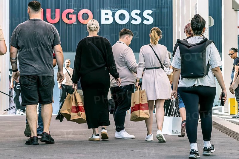 Shopping in Outletcity Metzingen. The 500 premium and luxury brands focus on clothing, but also offer beauty and home products. Outletcity AG around Hugo Boss is the first and one of the largest outlet locations in Germany. Metzingen, Baden-Württemberg, Germany