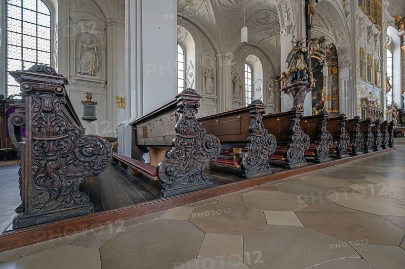 Carved cheeks of the old church pews in the court church of Our Lady, a late Renaissance building built 1607 to 1608, Karlsplatz, Neuburg an der Donau, Upper Bavaria, Germany