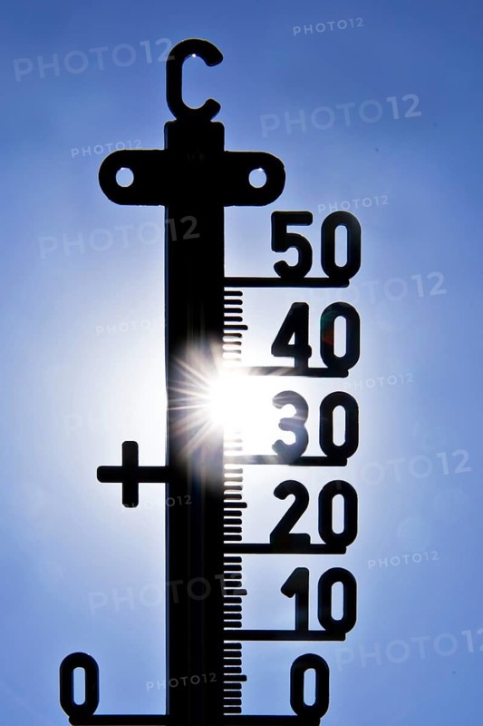 Thermometer shows heat in blazing sun and cloudless sky, symbolic image, summer 2026, Witten, North Rhine-Westphalia, Germany