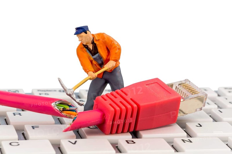 Worker, network plug, keyboard, symbolic photo for the Internet, Stopping, Maintenance, Problem Solving, Austria