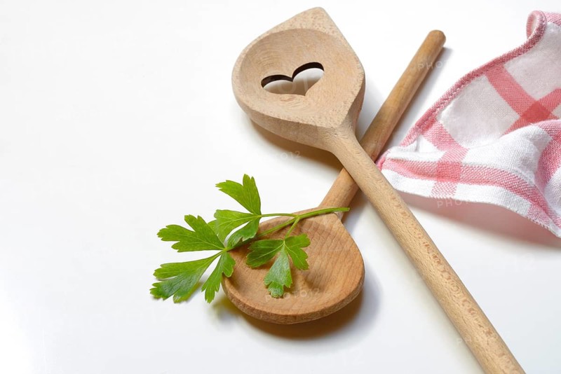 Cooking spoon and parsley, herb, Petroselinum crispum