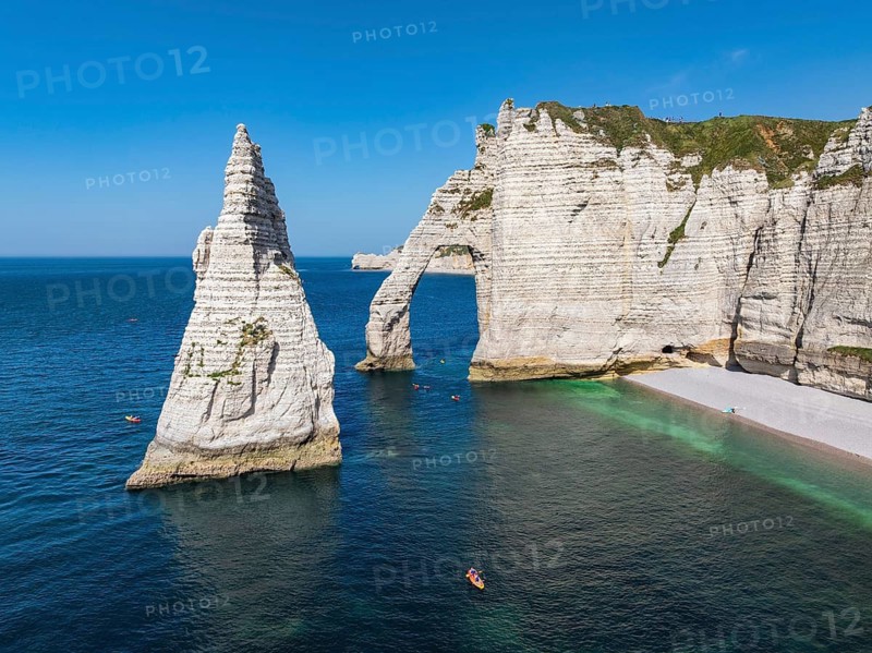 Aerial view of the Porte d'Aval rock formation, a landmark on the chalk coast with the distinctive rock gate, next to it the free-standing rock pin Aiguille d'Étretat, Étretat, Alabaster Coast, La Côte d'Albâtre, Chalk Cliffs, English Channel, Seine-Maritime, Normandy, France