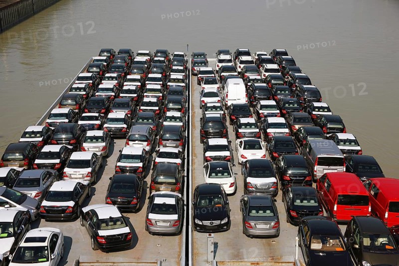 A tow barge fully loaded with new cars, Vienna, Austria