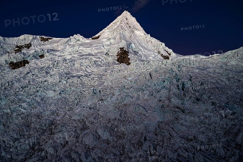 Alpamayo with alpamayo glacier in the evening light, 5947 m, with the title of most beautiful mountain in the world, Cordillera Blanca, Huascaran National Park, northern Peru, Peru, South America