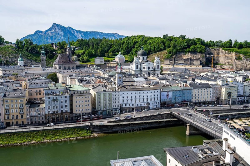 View of the city of Salzburg from Kapuzinerberg, Salzach and colorful houses on the river, old town with collegiate church and church of St. Peter, Salzburg, Austria