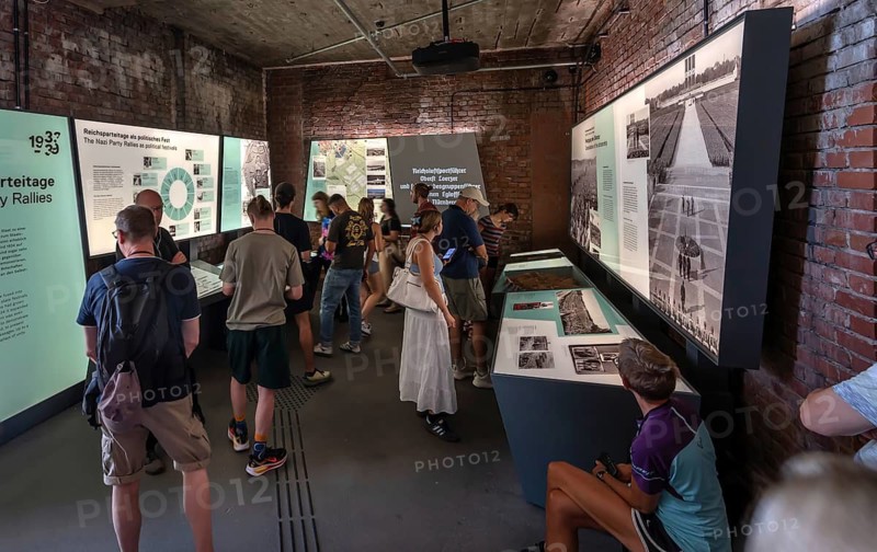 Visitors in the exhibition room of the Museum Documentation Center, Documentation Center Reichsparteitagsgelände, Bayernstr. 110, Nuremberg, Middle Franconia, Bavaria, Germany