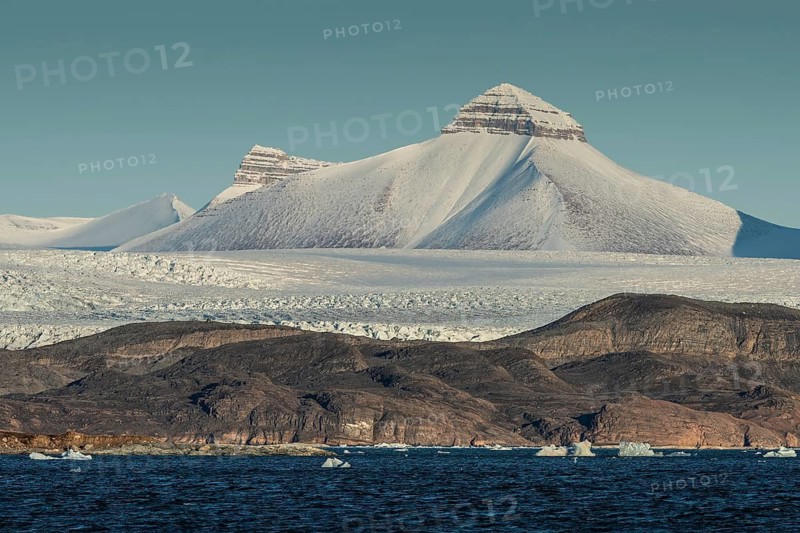 Glacier front and one of the three mountains known as Tee Kroner (Three Crowns), Kronebreen or Kronengletscher Glacier, Kongsfjord or Kongsfjorden, the Svalbard archipelago, Svalbard, Norway