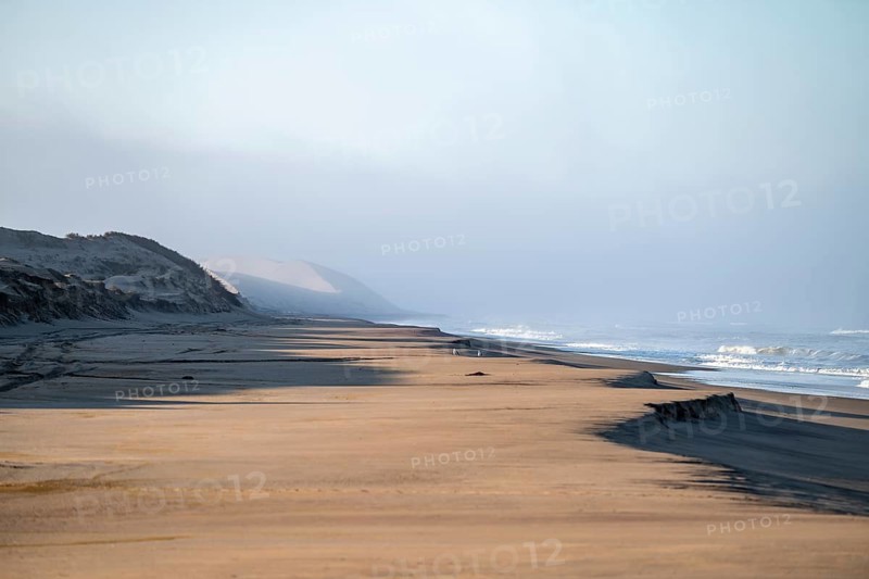 Atlantic coast, sandy beach and sand dunes, desert landscape and sea, Namib Naukluft Park, Namib Desert, Namibia