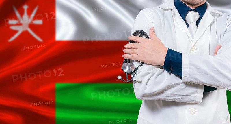 Omani national health system, Medical professional holding sthetoscope isolated