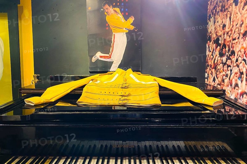 Zanzibar, Tanzania - 15th october, 2025: Freddie Mercury Museum interior with piano and iconic yellow stage jacket exhibition