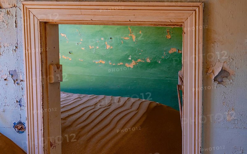 Interior view, doors and house full of sand, former diamond mining town, Namib Desert, Kolmanskop, Karas, Namibia
