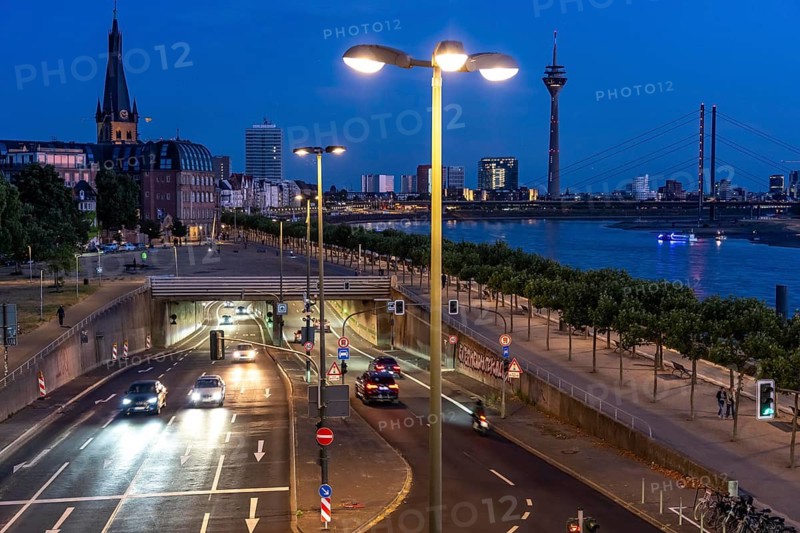 The Rhine Bank Tunnel in Düsseldorf, 1928 meters long, four-lane road tunnel Bundesstraße B1, along the Rhine, below the banks of the Old Town, here the northern entrance at the Oberkassler Bridge, looking south, old town, Rhine Tower, North Rhine-Westphalia, Germany