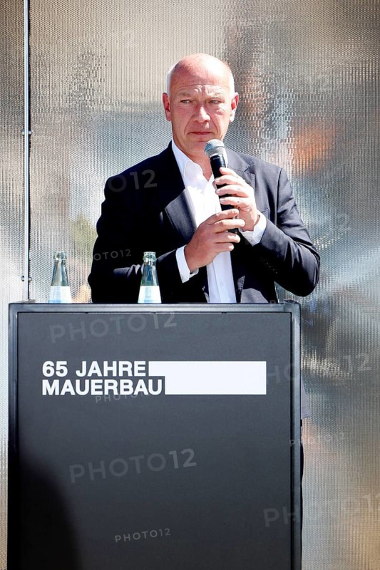 Kai Wegner (Governing Mayor of Berlin) speaks at the press conference marking the 65th anniversary of the construction of the Berlin Wall on Platz des 18. März in Berlin on 12 August 26