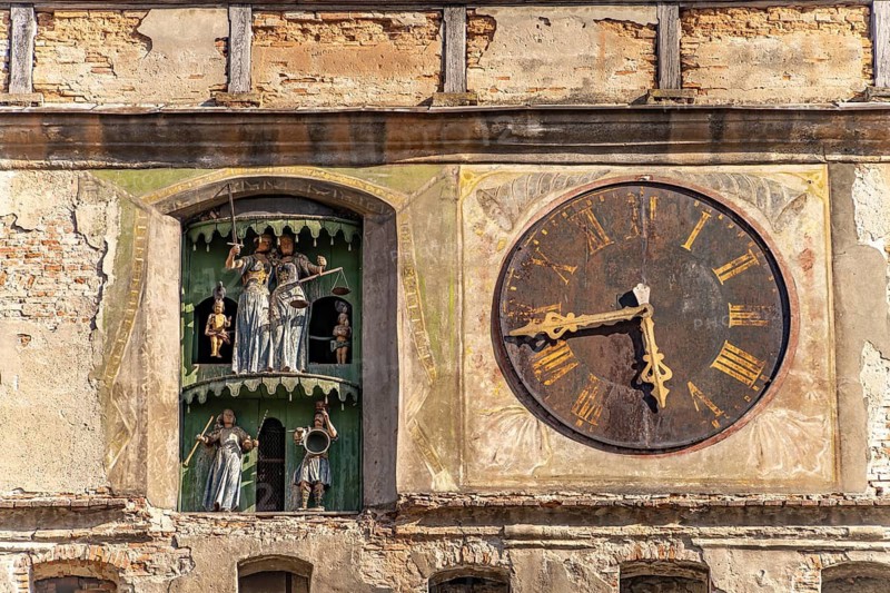 Clock with puppets of the landmark hour tower in Sighisoara or Sighi?oara, Transylvania, Romania