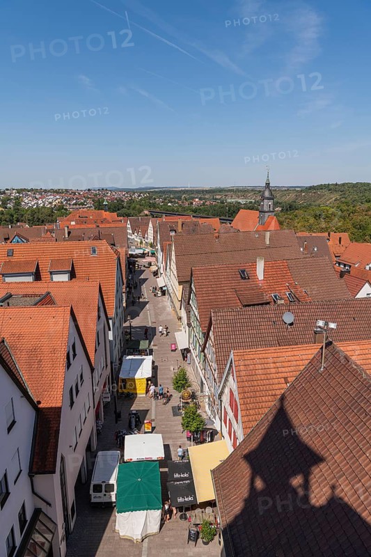 View from the Upper Tower of the Marktstraße, historic old town of Marbach am Neckar, weekly market market, market stand, dealers, sellers, shops, pedestrian zone, roofs, roofscape, historic old town, half-timbered houses, historic buildings, cityscape, old town alleys, Neckar region, Baden-Württemberg, bird's-eye view, city view, historic architecture, red tile roofs, rows of houses, city center, picturesque old town, medieval cityscape, historic cityscape, urban roof landscape