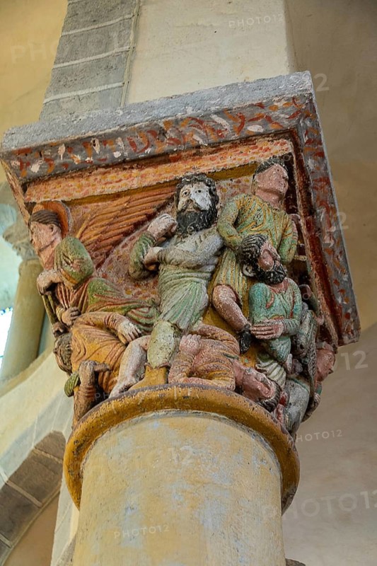 Capital of romanesque church of Saint Nectaire, Assault from the Angel, Puy de Dome, Auvergne Rhone Alpes, France