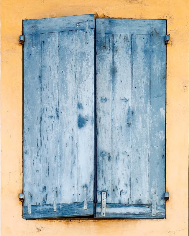 Window with closed blue shutters, Provence, France