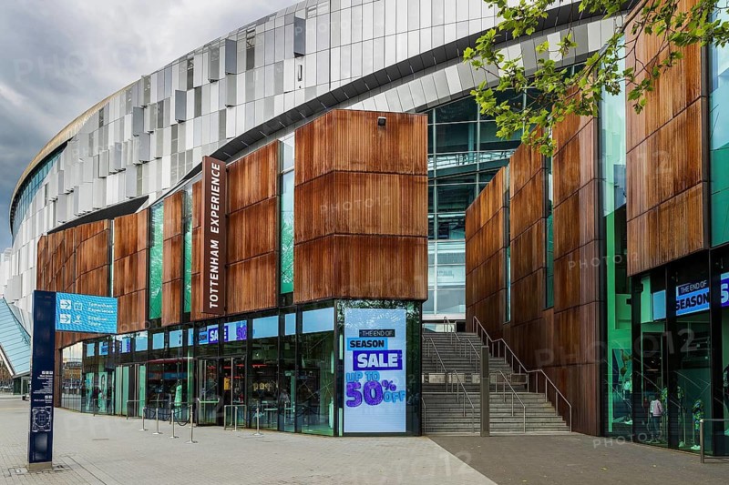 Timber cladding wraps the Tottenham Experience building, the retail and museum wing of the stadium, London, England, United Kingdom